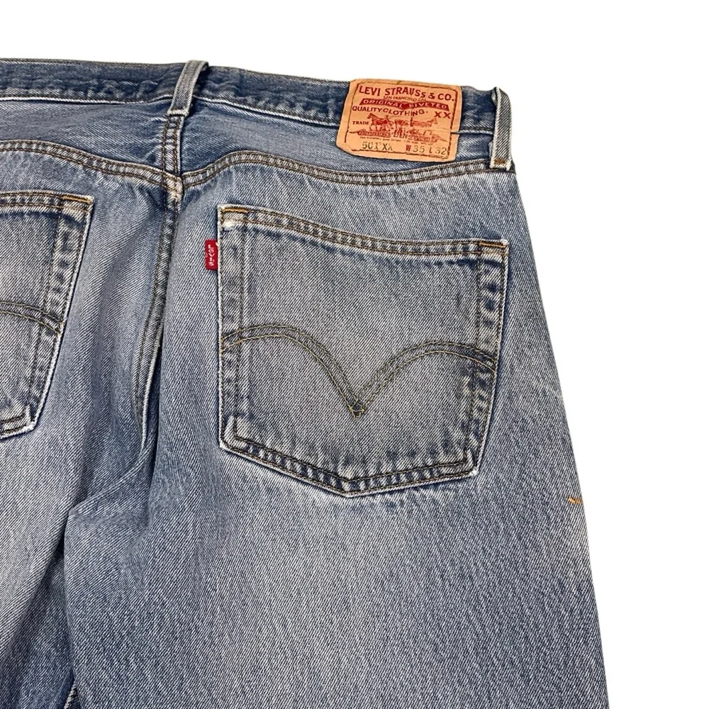 Vintage Levi’s 501XX button fly straight leg 90s medium wash jeans 34 x 29